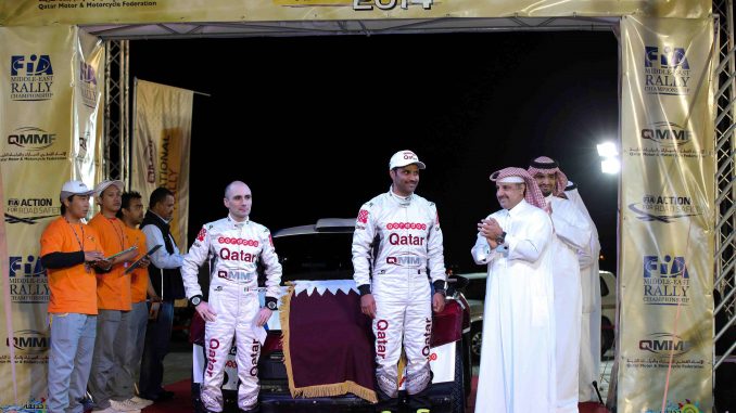 Giovanni Bernacchini and Nasser Saleh Al-Attiyah at the 2014 QMMF Qatar International Rally.