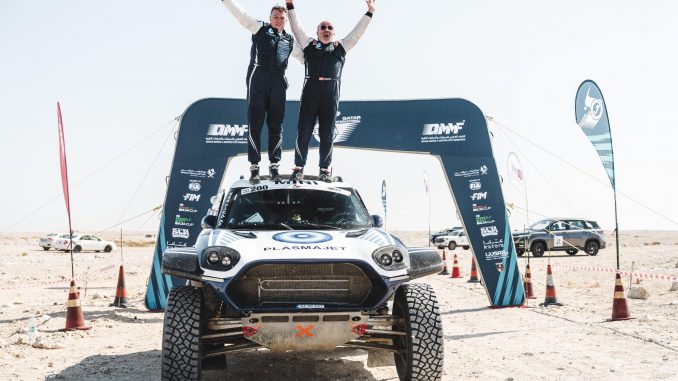 Denis Krotov and Konstantin Zhiltsov celebrate their win in Qatar.